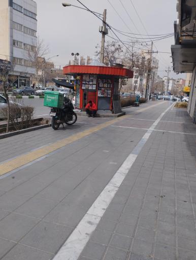 عکس روزنامه فروشی سید