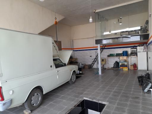 عکس تعمیرگاه اتومبیل اعتماد