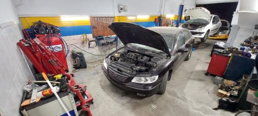 عکس مجتمع تعمیرگاهی تاپ سرویس