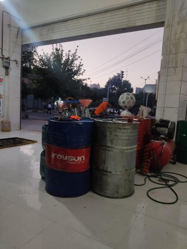 عکس تعويض روغنی برادران روحانی 