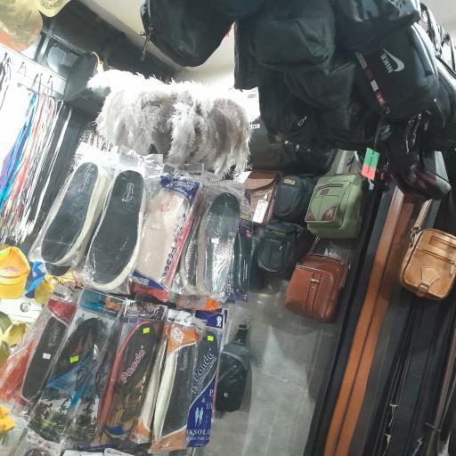 کفاشی و کیف فروشی پابرهنه 