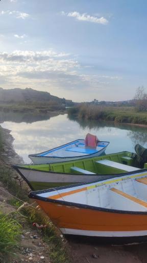 عکس لنگرگاه قایق های موتوری کارون