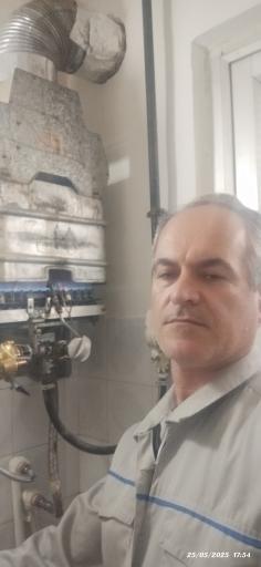 عکس تعمیرات و جوشکاری مبدل پکیج و آبگرمکن