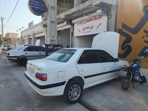 عکس کلینیک تخصصي خودرو پورمفیدی
