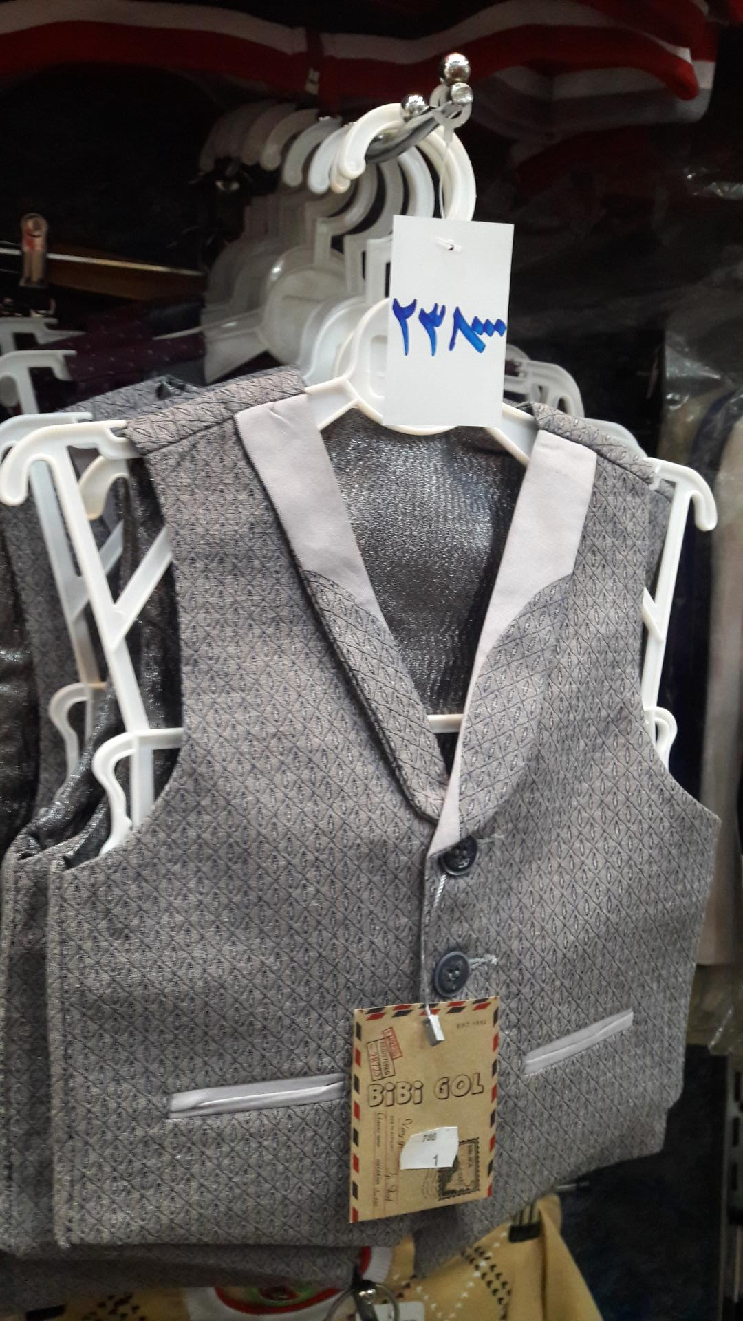 عکس فروشگاه پوشاک بچه گانه فرشتگان