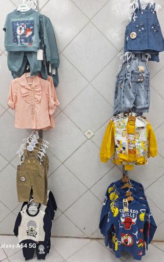 عکس پوشاک کودک آیسا