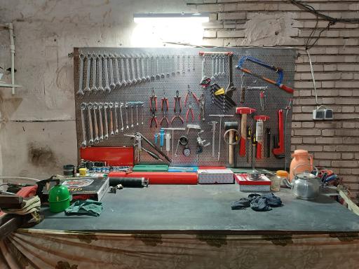 عکس تعمیرگاه خودرو مکانیکی آداک