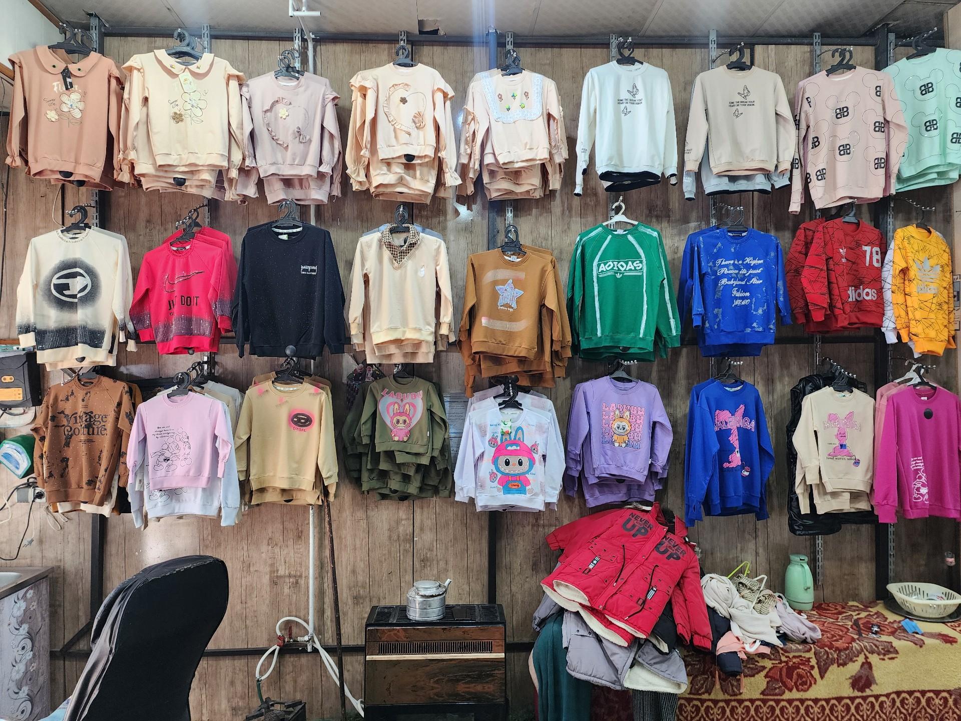 عکس ارزانسرای پوشاک کربلاییها 