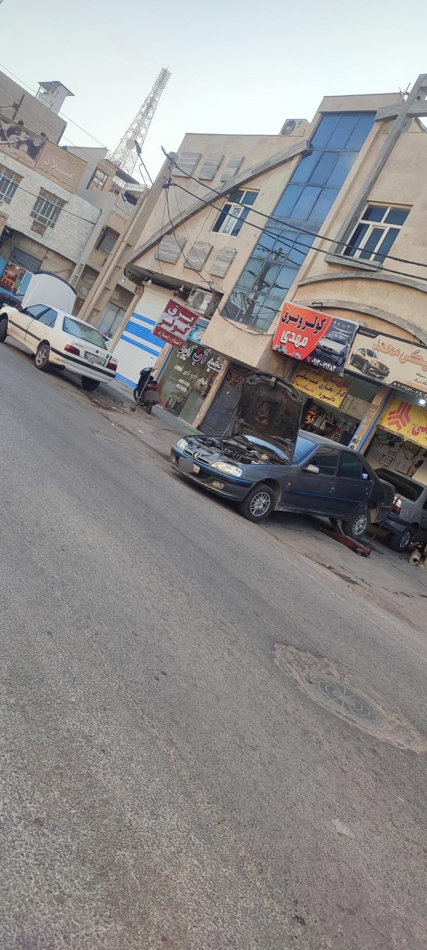 عکس تعمیرگاه کولر و برق خودرو مهدی