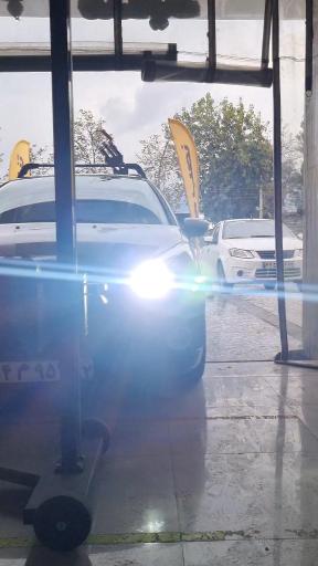 عکس مرکز تنظیم نور خودرو تزیین چی