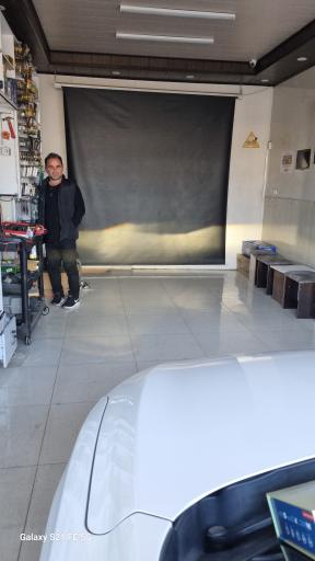 عکس مرکز تنظیم نور خودرو تزیین چی