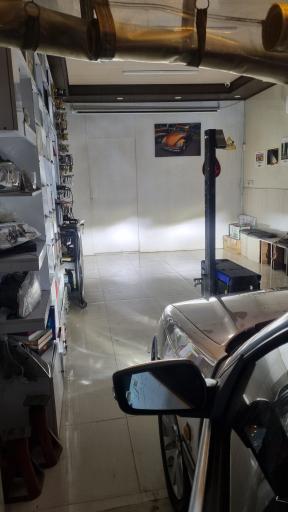 عکس مرکز تنظیم نور خودرو تزیین چی