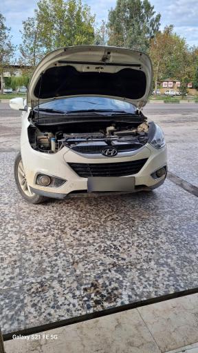 عکس مرکز تنظیم نور خودرو تزیین چی