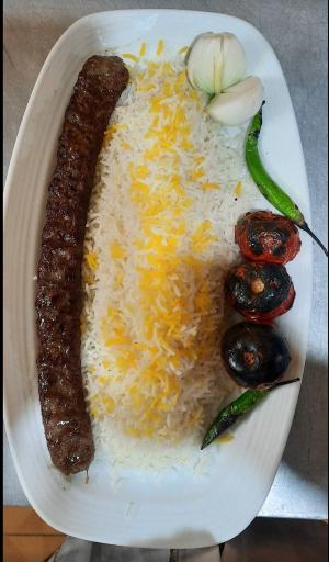 عکس تهیه غذای دهکده