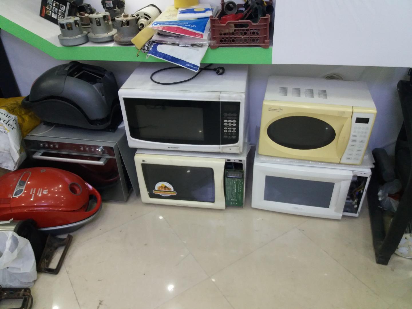 عکس تعمیر ماکروفر رحیم پور