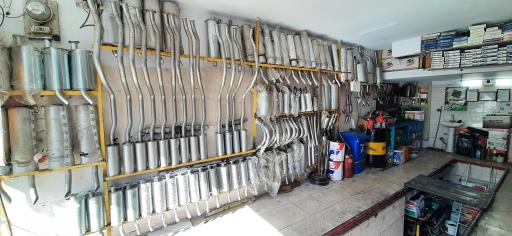 عکس جهان‌ اگزوز تعویض روغن برادران