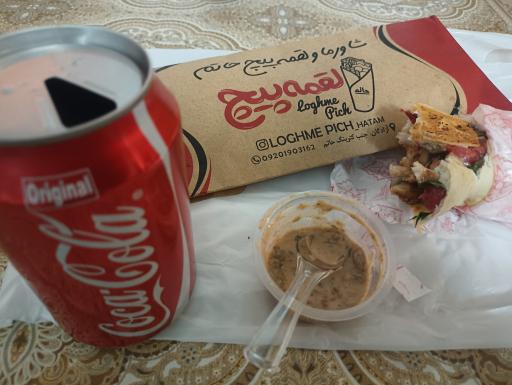 عکس شاورما لقمه پیچ حاتم