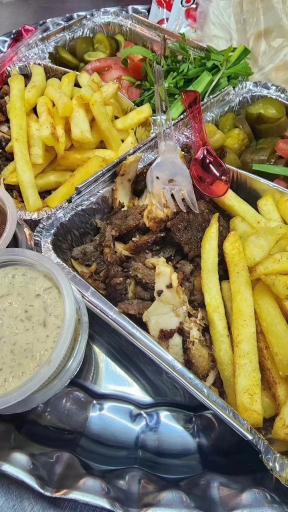 عکس شاورما لقمه پیچ حاتم