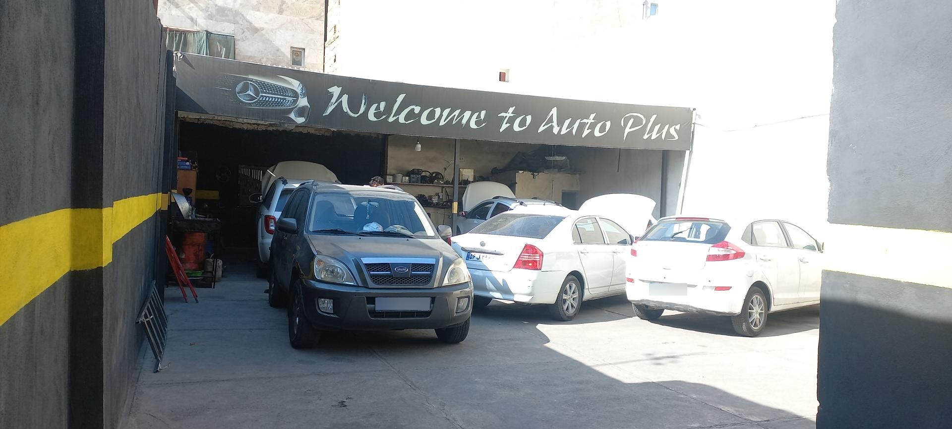 عکس تعمیرگاه ماشین های چینی