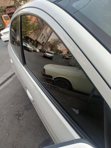 عکس شیشه اتومبیل دودی نایت گلس