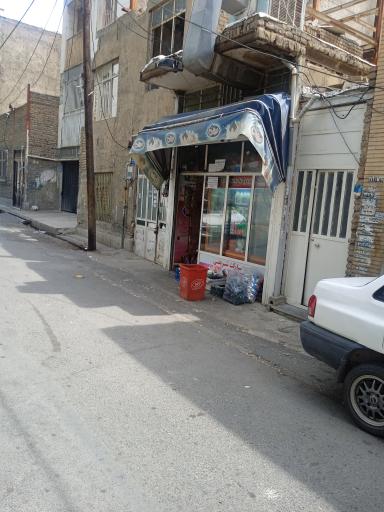 عکس سوپر مارکت شریفی