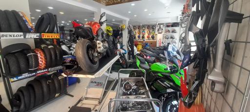 عکس فروشگاه و تعمیرگاه موتوجی