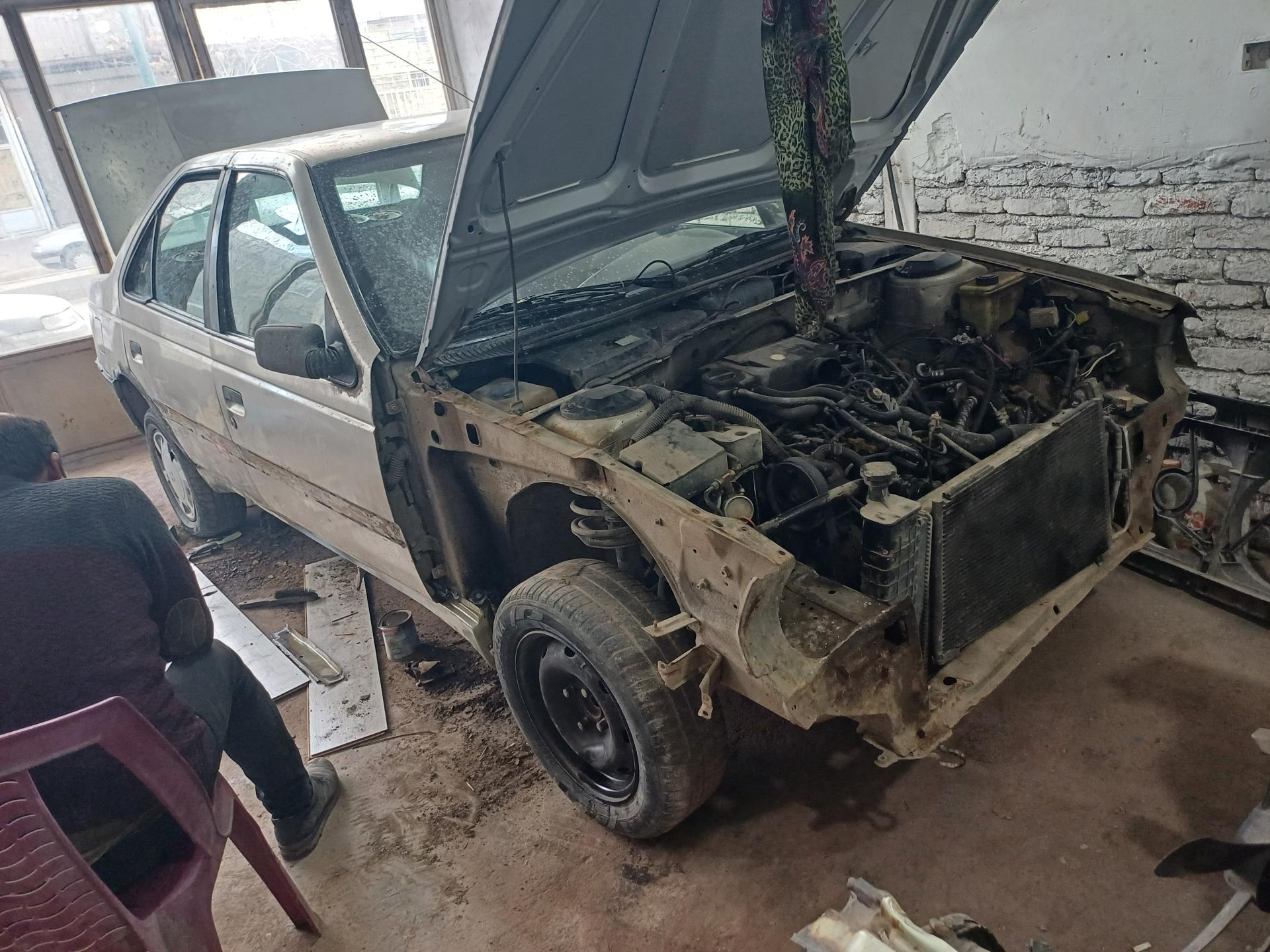 عکس تعمیرگاه خودروشریفی