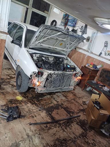 عکس تعمیرگاه خودروشریفی