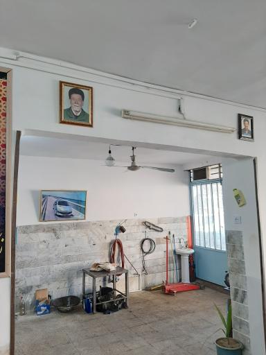 عکس تعمیرگاه و دفتر امدادخودرو اتومبیل قربانی