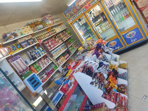 عکس سوپرمارکت دهکده