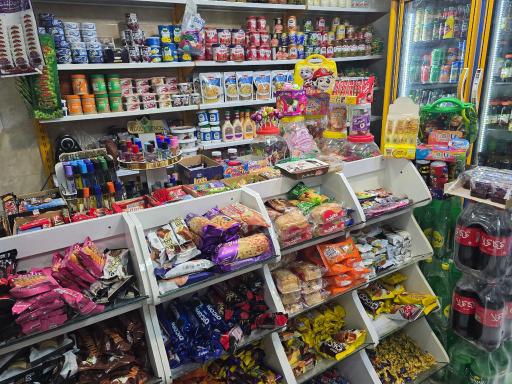 عکس سوپرمارکت دهکده