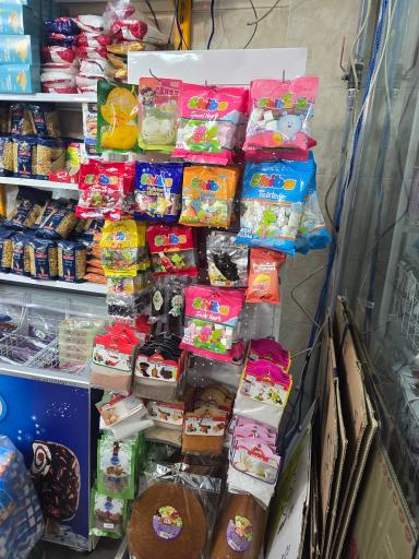 عکس سوپرمارکت دهکده