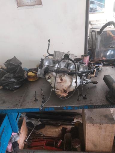 عکس تعمیرگاه و دفتر امدادخودرو اتومبیل قربانی