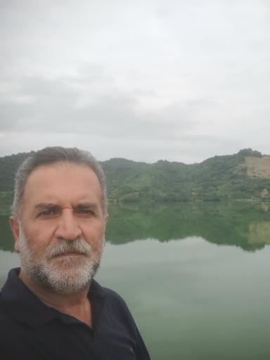 عکس قایق سواری چوبی سنتی تالاب استیل