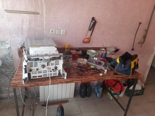 عکس تعمیر گاه خانه گرم