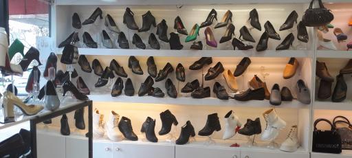 عکس تعمیرات و فروش کیف و کفش هخامنش