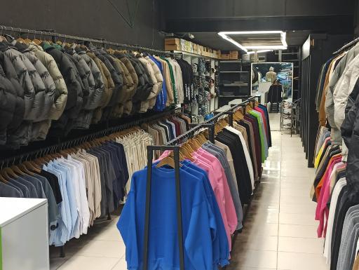 عکس فروشگاه پوشاک مردانه گوزن