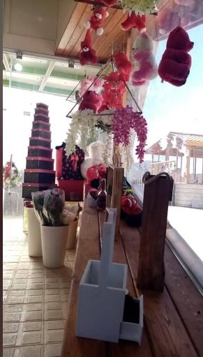 عکس مزون لباس عروس کلبه گل