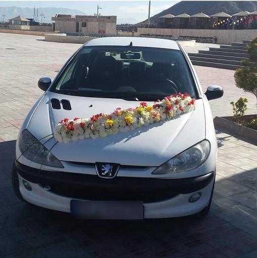 عکس مزون لباس عروس کلبه گل