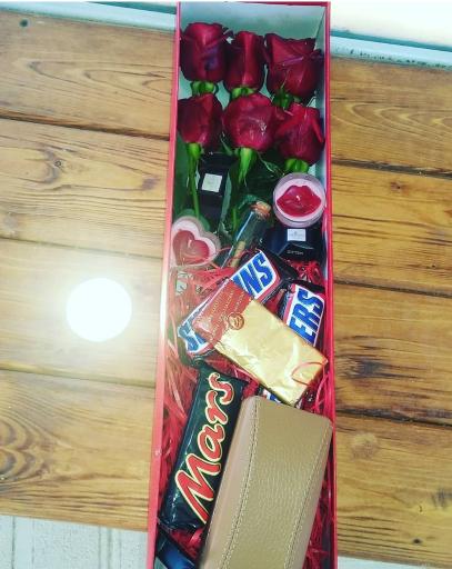 عکس مزون لباس عروس کلبه گل