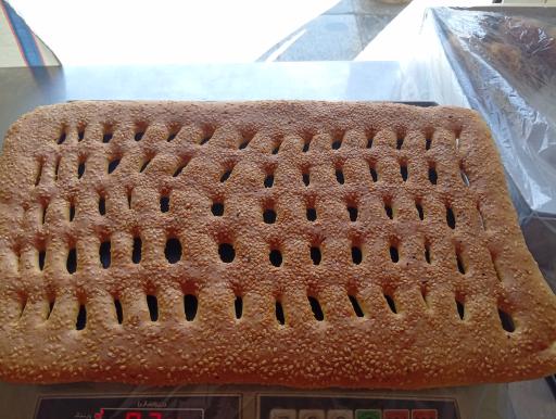 عکس حلوا مسقطی  سنتی لاری ضیافت