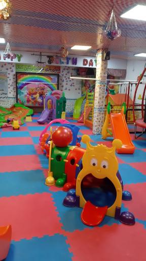 عکس خانه کودک و بازی رنگین کمان