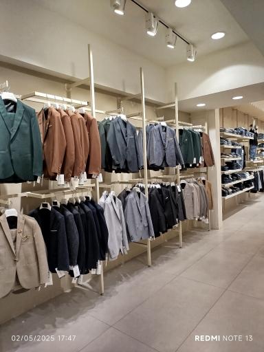 عکس فروشگاه لباس کودک داوین 