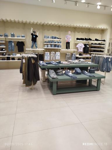 عکس فروشگاه لباس کودک داوین 