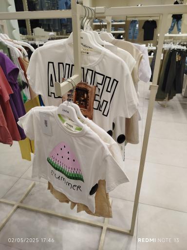 عکس فروشگاه لباس کودک داوین 