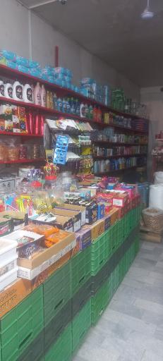 عکس سوپرمارکت  تک محله