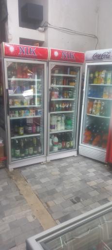 عکس سوپرمارکت  تک محله