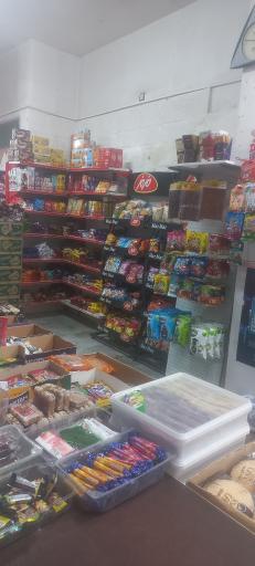 عکس سوپرمارکت  تک محله