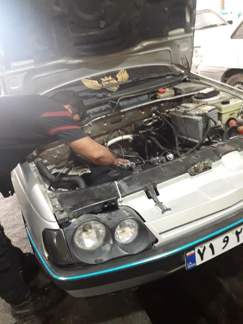 عکس تعمیر پژو و پراید استاد داوود