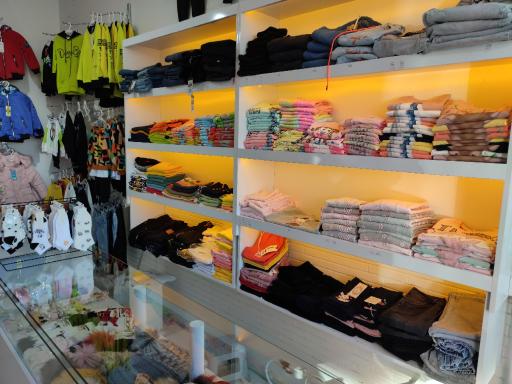 عکس گالری پوشاک بچه گانه مینیون